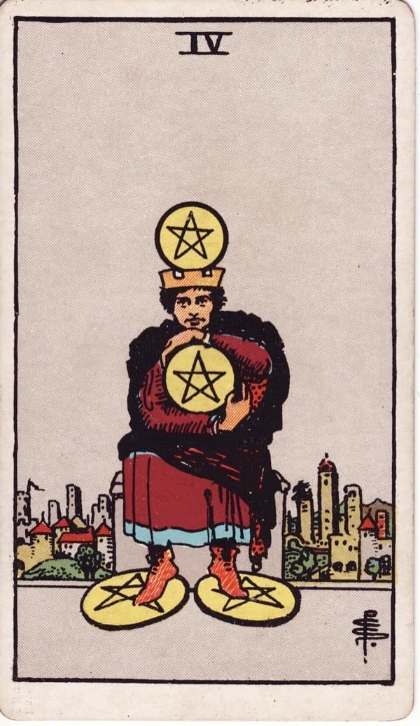 Four of Pentacles reversed